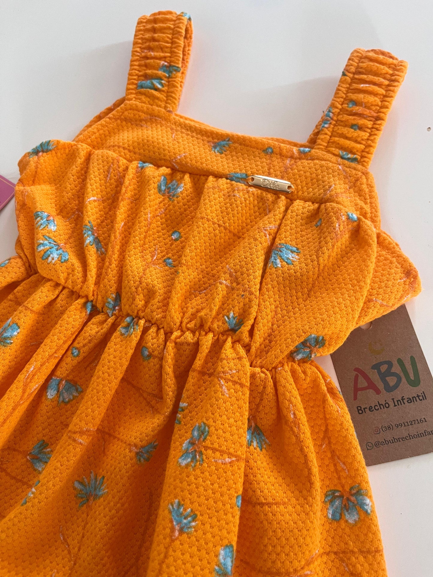 Vestido laranja com flores Dila