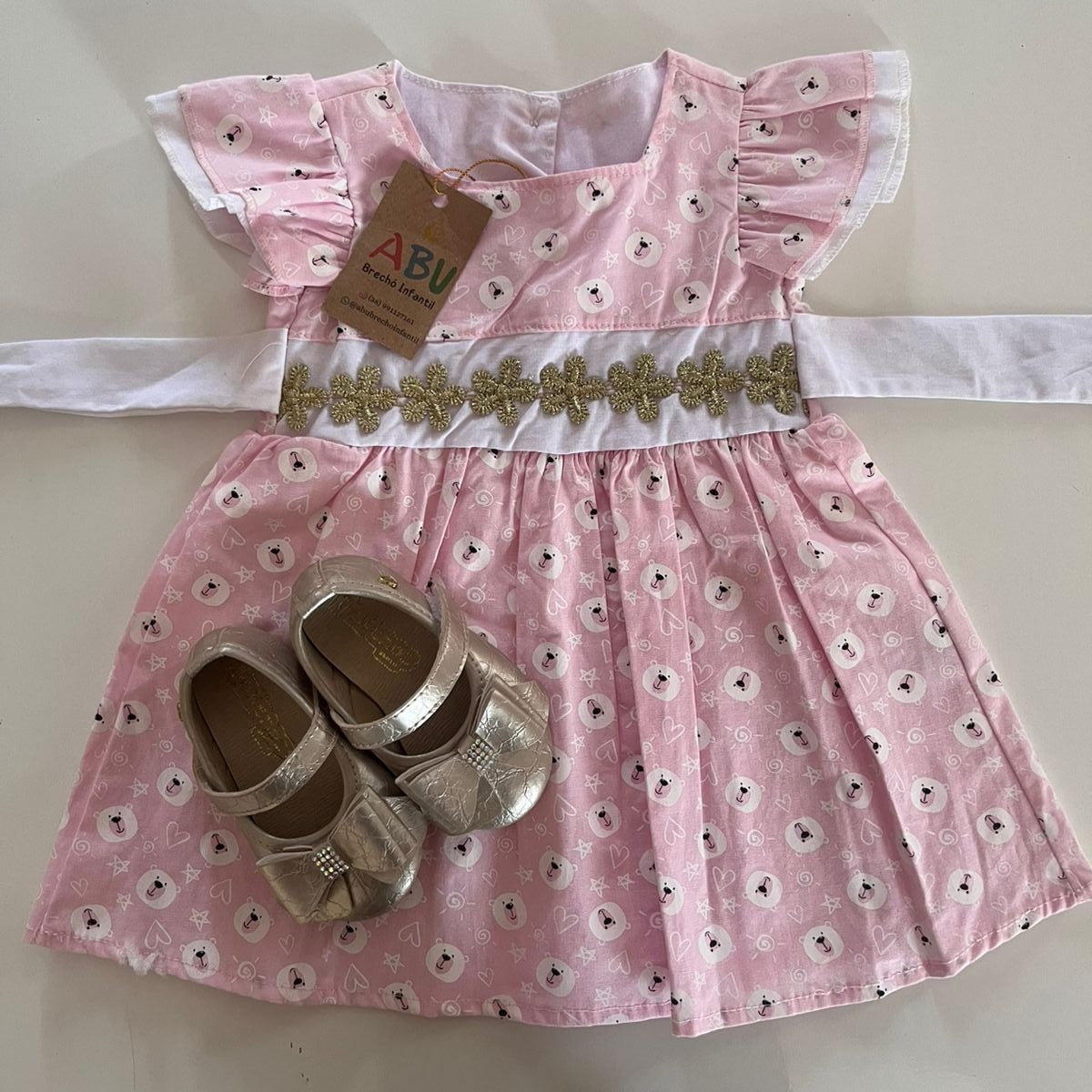 Vestido 100% algodão com estampa de urso rosa com aplicação de bordados dourados na cintura tamanho P Veste de 3 a 6 meses